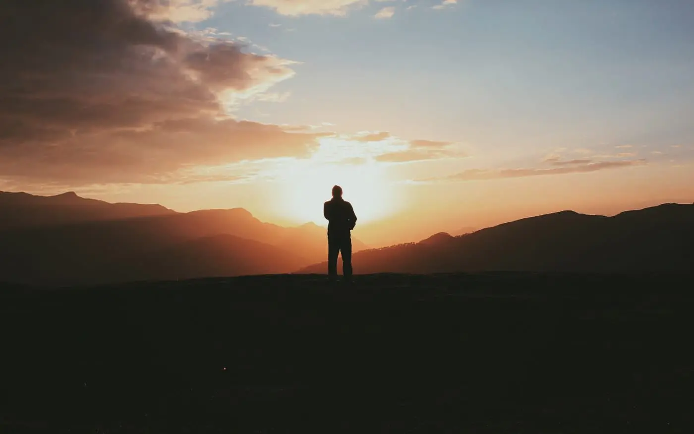 Silhouette of person on a hill - what is your identity in Christ?